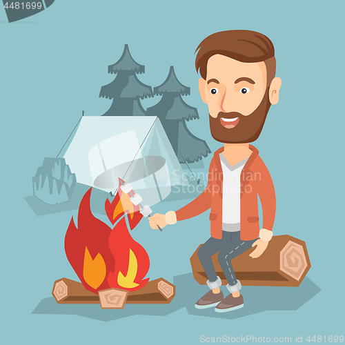 Image of Businessman roasting marshmallow over campfire.