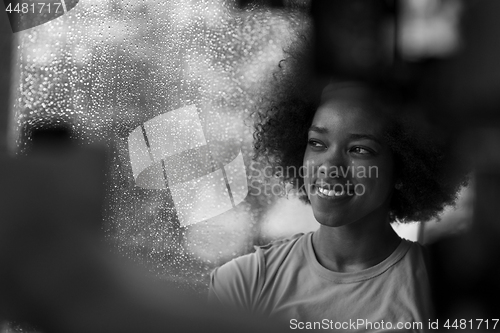 Image of african american woman using tablet