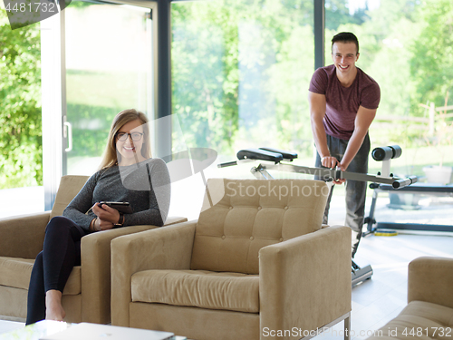 Image of couple relaxing at  home