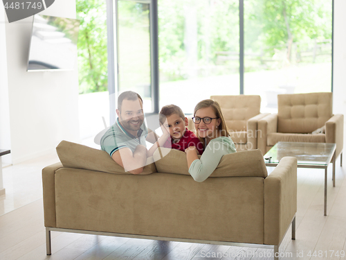 Image of family with little boy enjoys in the modern living room