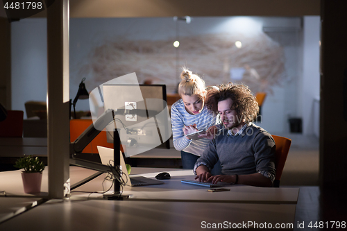 Image of young designers in the night office