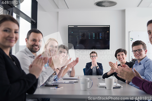 Image of Group of young people meeting in startup office