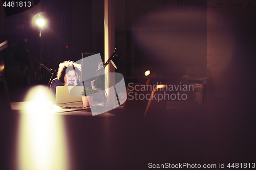 Image of businessman relaxing at the desk