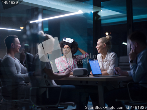 Image of Multiethnic Business team using virtual reality headset