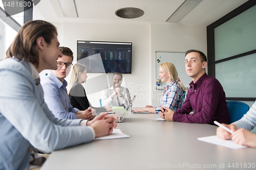 Image of Business Team At A Meeting at modern office building