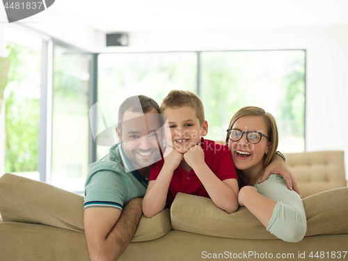 Image of family with little boy enjoys in the modern living room