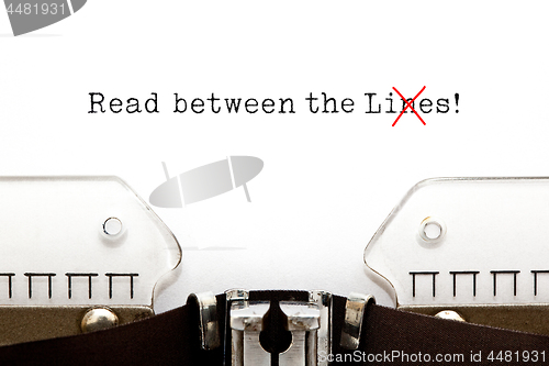 Image of Read Between The Lies Concept On Typewriter