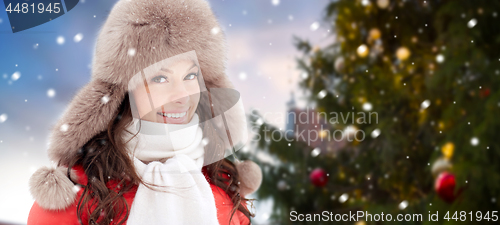 Image of happy woman over christmas tree in tallinn