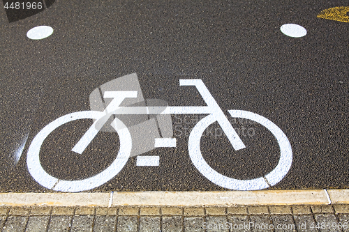 Image of Bicycle sign on the road in  Lisbon Portugal