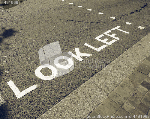 Image of Vintage looking Look Left sign