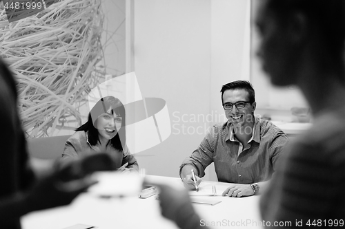 Image of Business Team At A Meeting at modern office building
