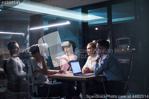 Image of Multiethnic Business team using virtual reality headset