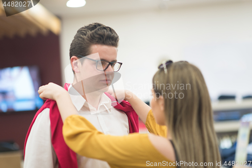 Image of couple in  Clothing Store