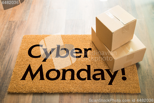 Image of Cyber Monday Welcome Mat On Wood Floor With Shipment of Boxes