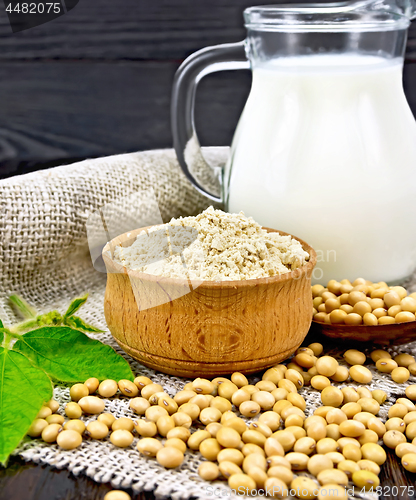 Image of Flour soy in bowl with soybeans and milk on sacking