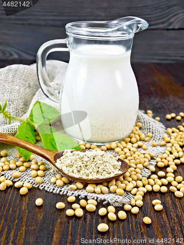 Image of Flour soy in spoon with milk on board