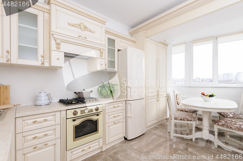 Image of Modern beige colored luxury kitchen