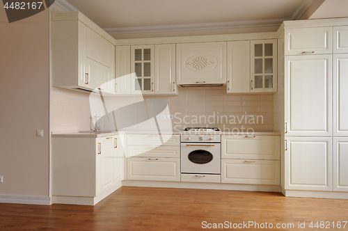 Image of Classic cream colored kitchen