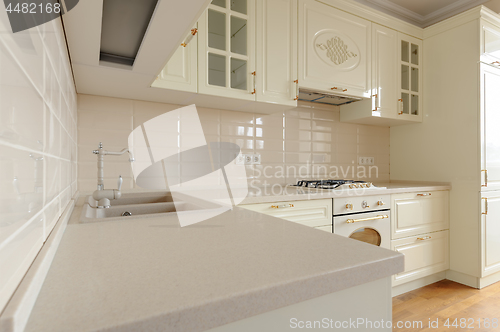 Image of Classic cream colored kitchen closeup