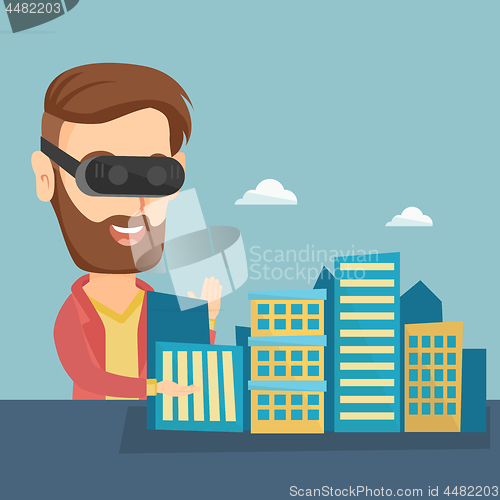 Image of Happy young man wearing virtual reality headset.
