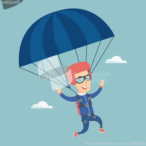 Image of Young happy man flying with a parachute.