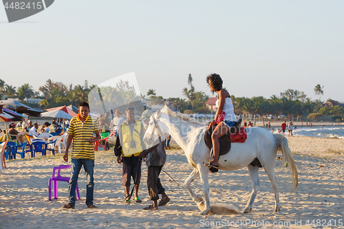 Image of Malagasy beauty, beautiful girls ride horse