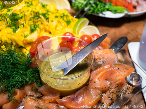 Image of Scandinavian smorgasbord with gravlax and mustard sauce