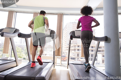 Image of people exercisinng a cardio on treadmill in gym