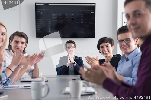 Image of Group of young people meeting in startup office