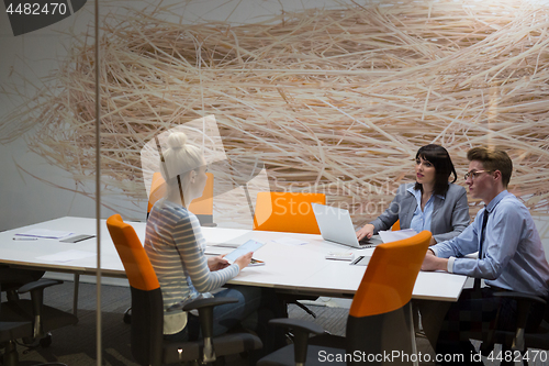 Image of Business Team At A Meeting at modern office building