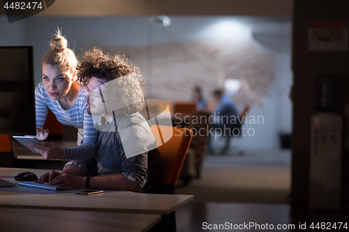 Image of young designers in the night office