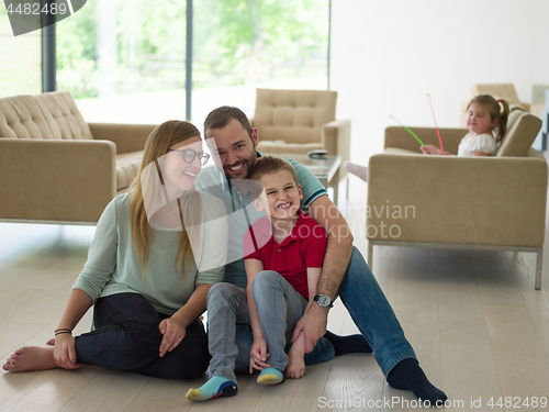 Image of family with little boy enjoys in the modern living room