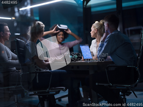 Image of Multiethnic Business team using virtual reality headset