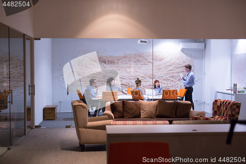 Image of Business Team At A Meeting at modern office building