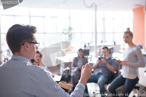 Image of Young Business Team At A Meeting at modern office building