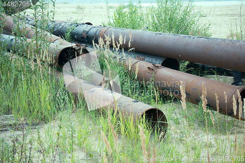 Image of pipe engineering construction on sand