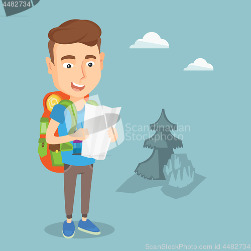 Image of Traveler with backpack looking at map.