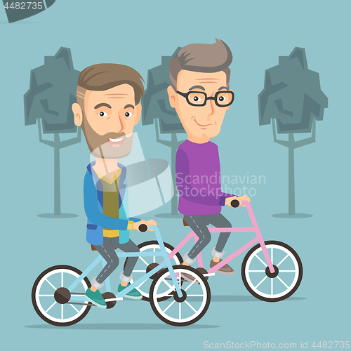 Image of Happy senior friends riding on bicycles in park