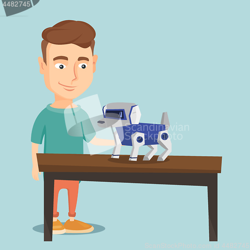 Image of Happy young man playing with robotic dog.