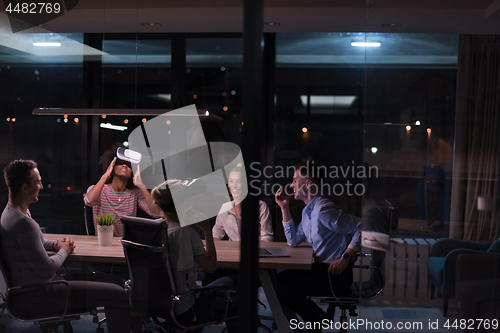 Image of Multiethnic Business team using virtual reality headset