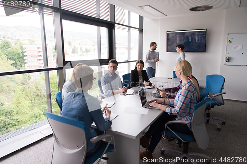 Image of Business Team At A Meeting at modern office building