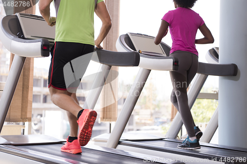 Image of people exercisinng a cardio on treadmill in gym