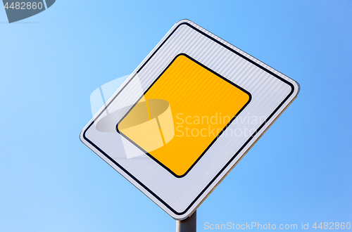 Image of Traffic signs main road against the blue sky background