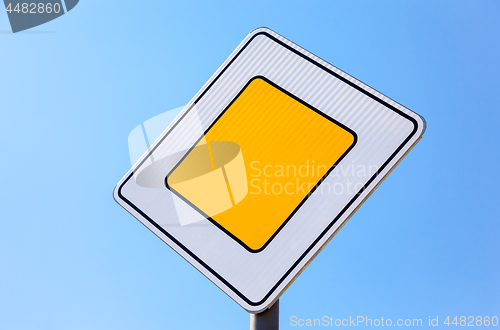 Image of Traffic signs main road against the blue sky background