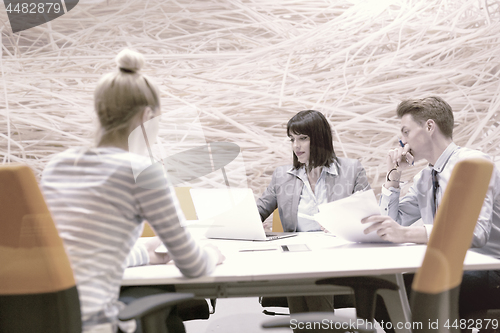 Image of Business Team At A Meeting at modern office building