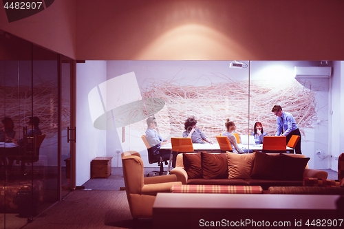 Image of Business Team At A Meeting at modern office building