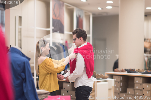 Image of couple in  Clothing Store