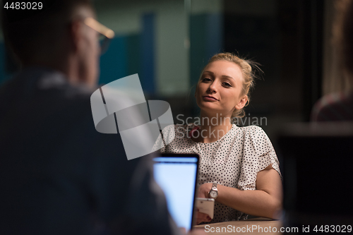 Image of Multiethnic startup business team in night office