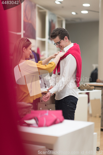 Image of couple in  Clothing Store