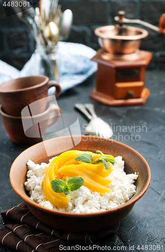 Image of cottage with mango